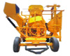 MIXER WITH HYDRAULIC HOPPER, ATTACHED HOIST